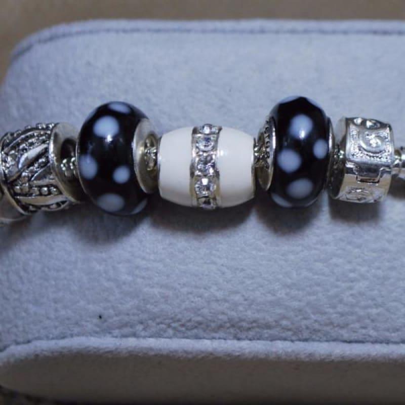 Black and White Pawprint Murano Glass Charm Bracelets - Charm bracelets